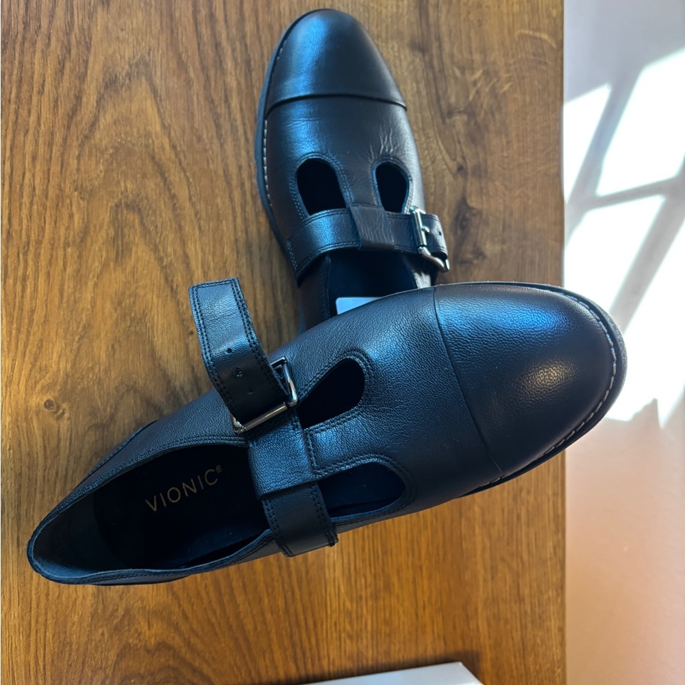 Vionic Black Leather Flats with Polished Finish